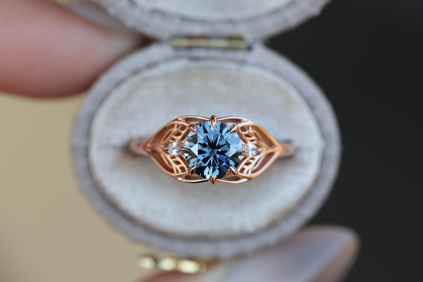 Elvindell three stone with 7mm dark blue moissanite