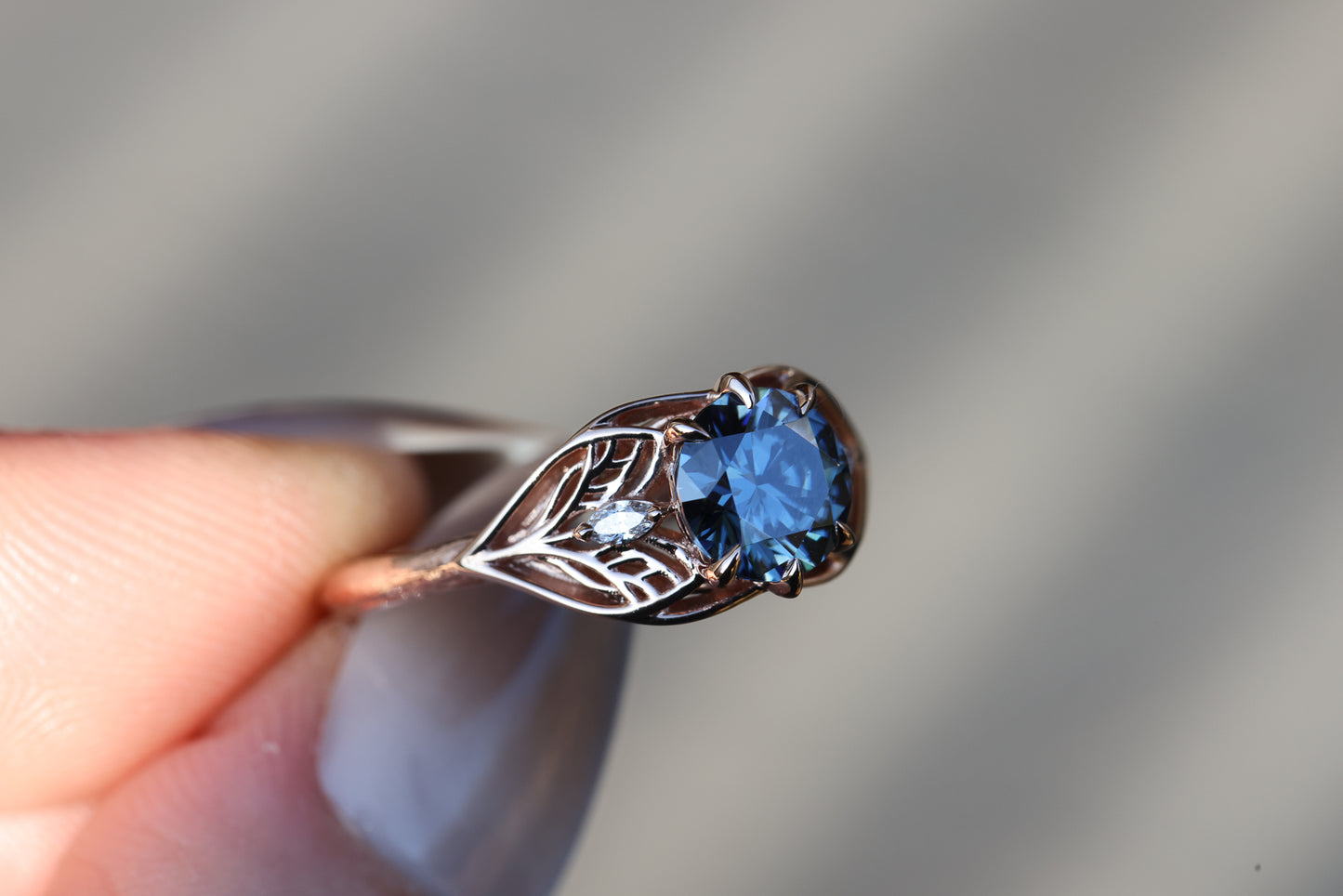 Elvindell three stone with 7mm dark blue moissanite