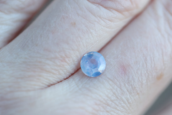 1.02ct round opalescent lavender sapphire