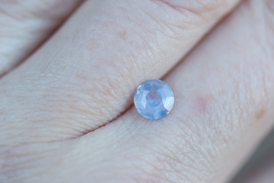 1.02ct round opalescent lavender sapphire