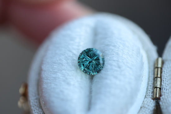 1.22ct round teal sapphire- Starbrite cut by John Dyer