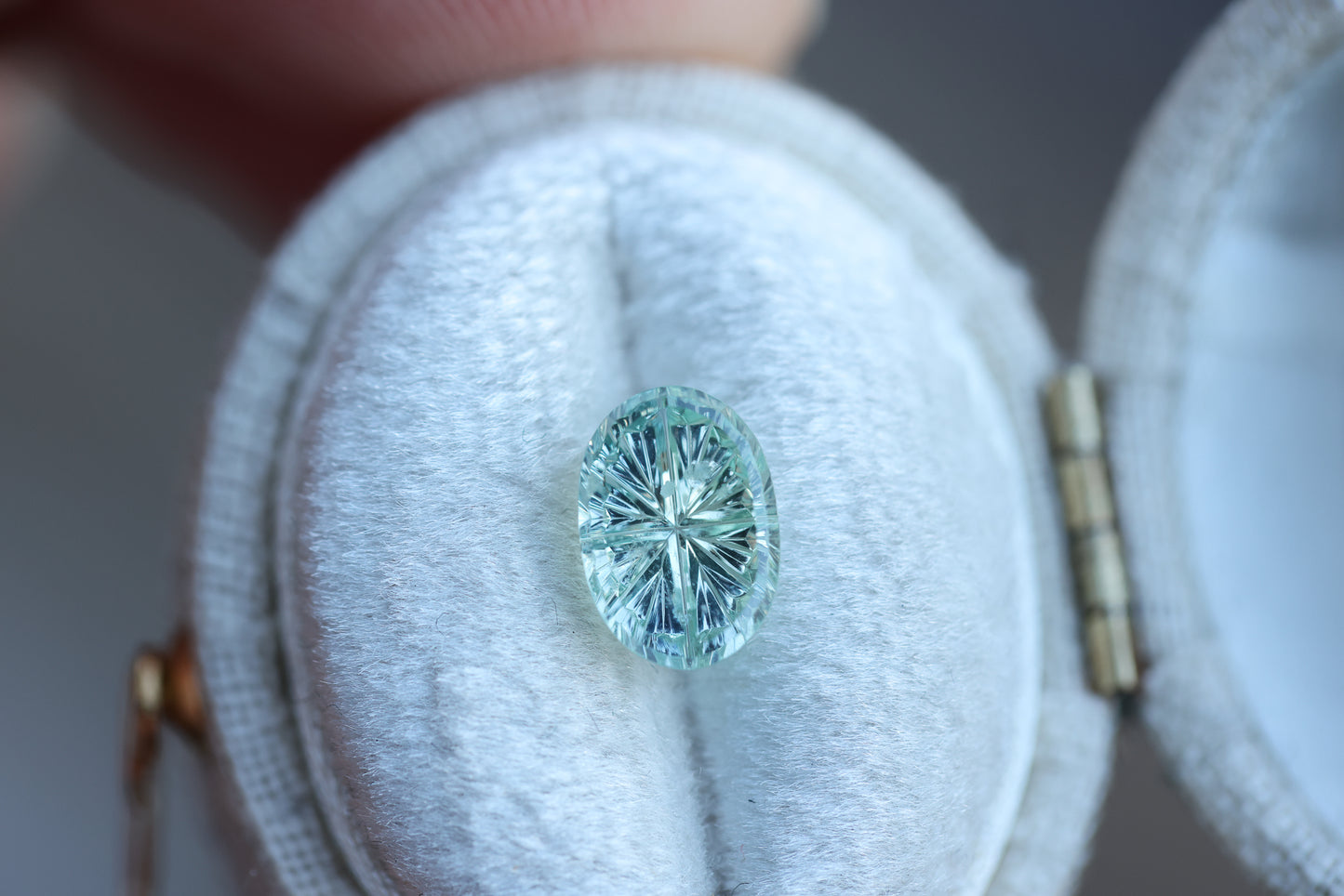 1.8ct light blue green oval sapphire- Starbrite cut by John Dyer