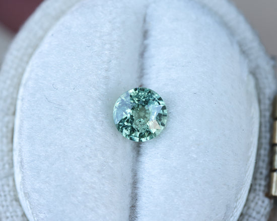 .66ct green teal round sapphire