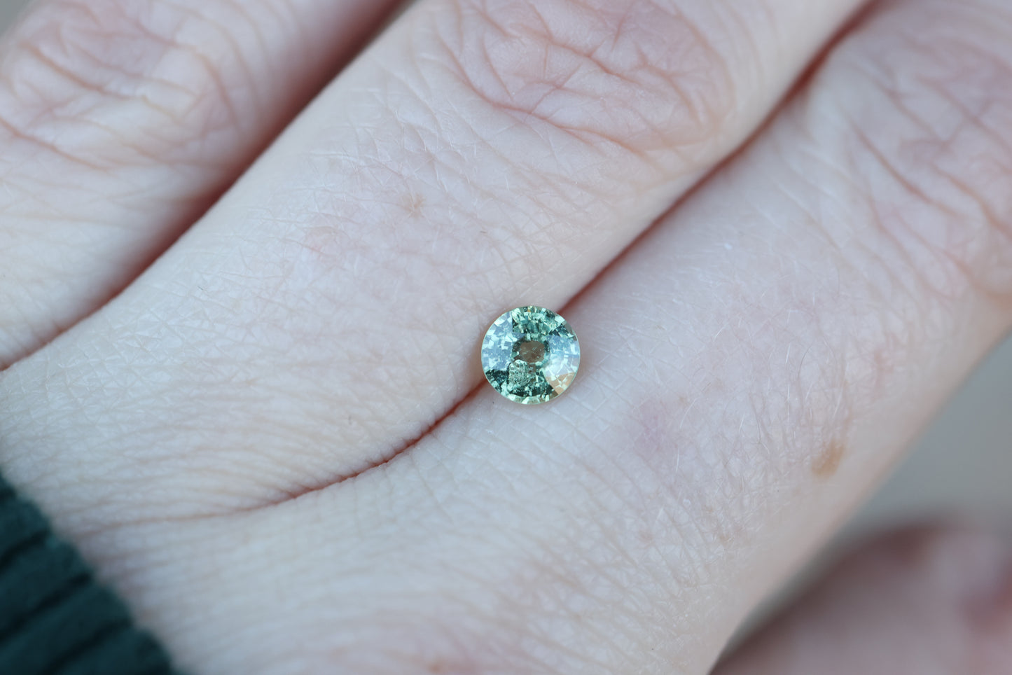 .66ct green teal round sapphire