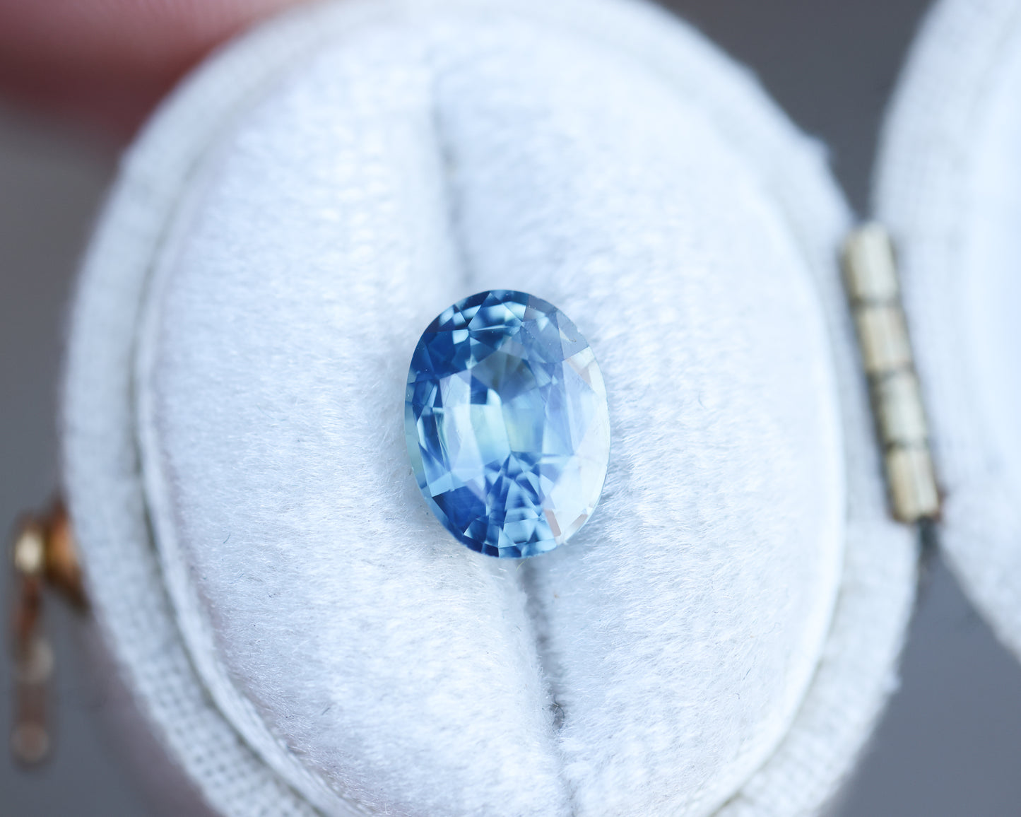 2.27ct oval blue teal opalescent sapphire