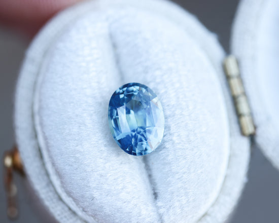 2.27ct oval blue teal opalescent sapphire