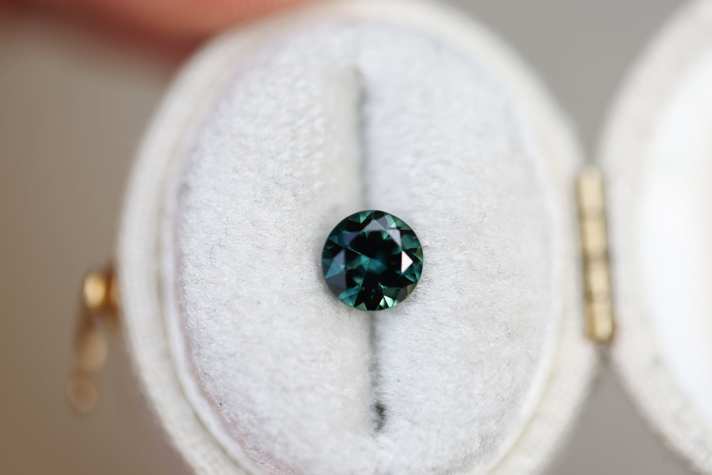 1.01ct Round Dark Green Blue Sapphire