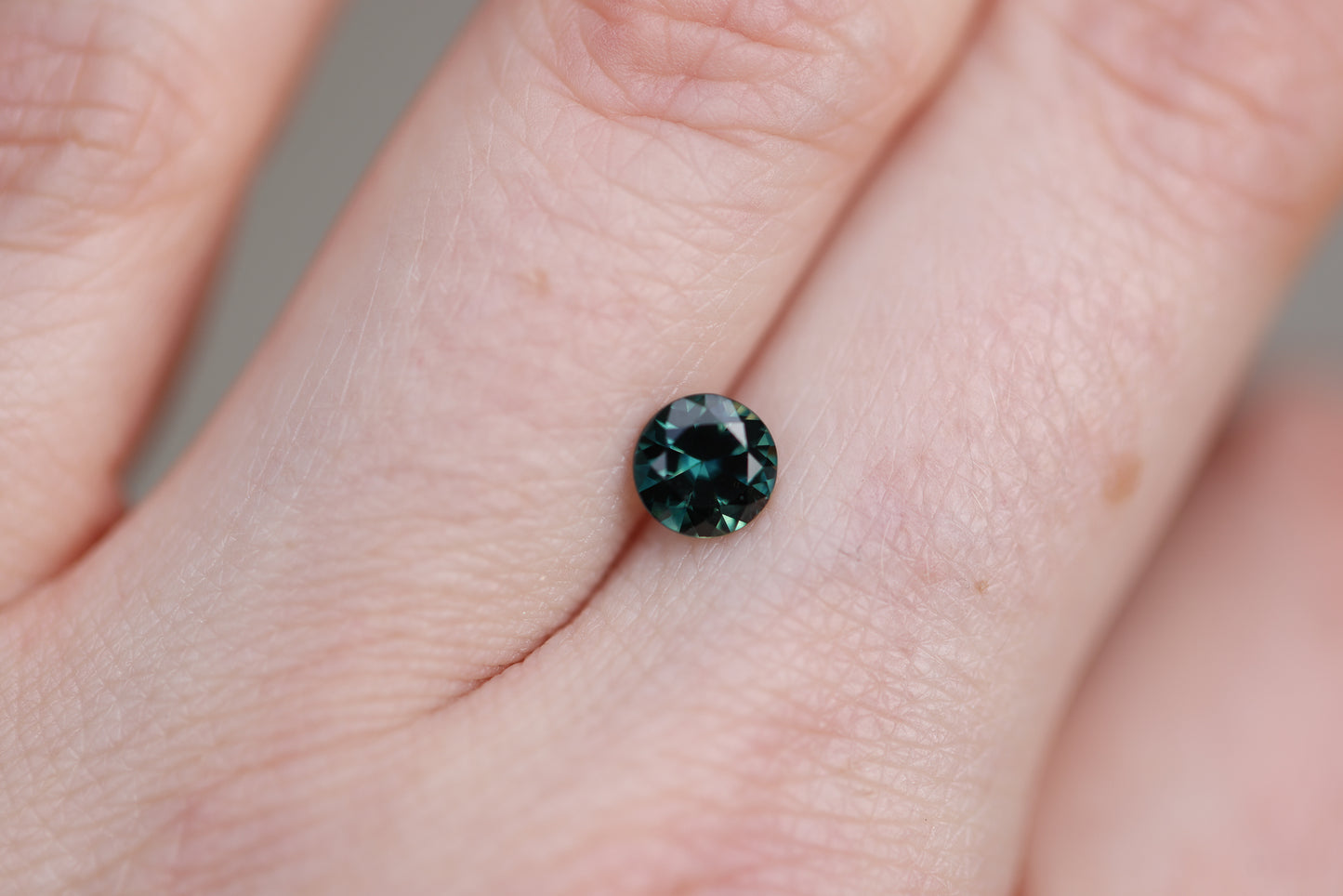 1.01ct Round Dark Green Blue Sapphire