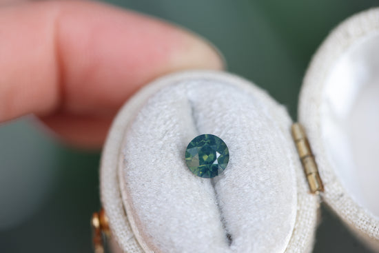 1.17ct Round Opalescent Teal Green Sapphire