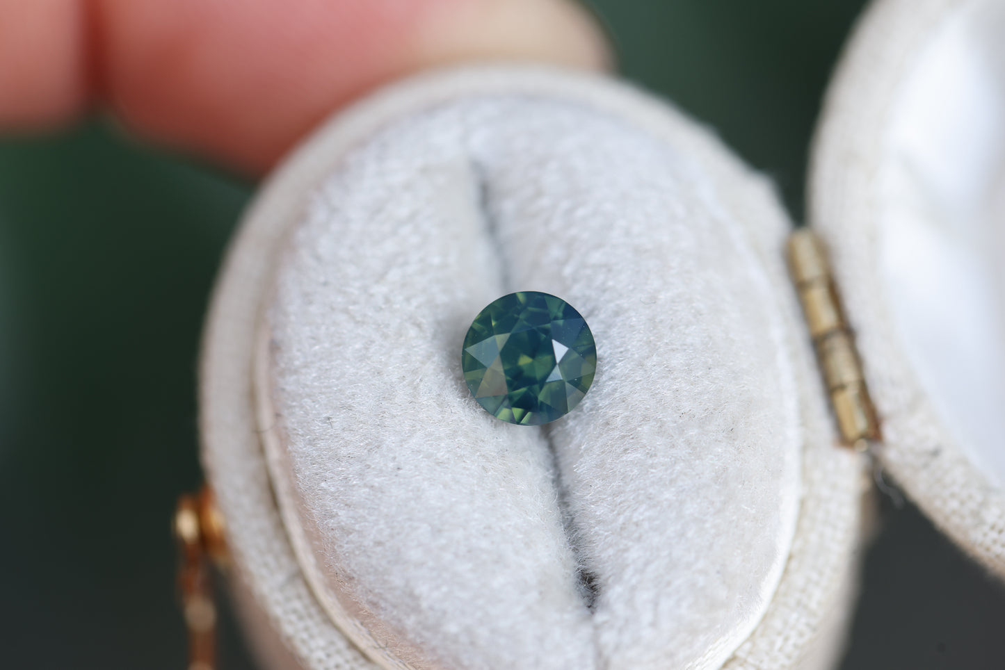 1.17ct Round Opalescent Teal Green Sapphire