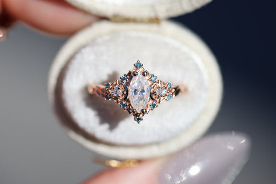 Load image into Gallery viewer, Briar moon with marquise moissanite center and aqua diamond accents
