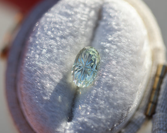 1.28ct oval light yellow green sapphire - Starbrite cut by John Dyer