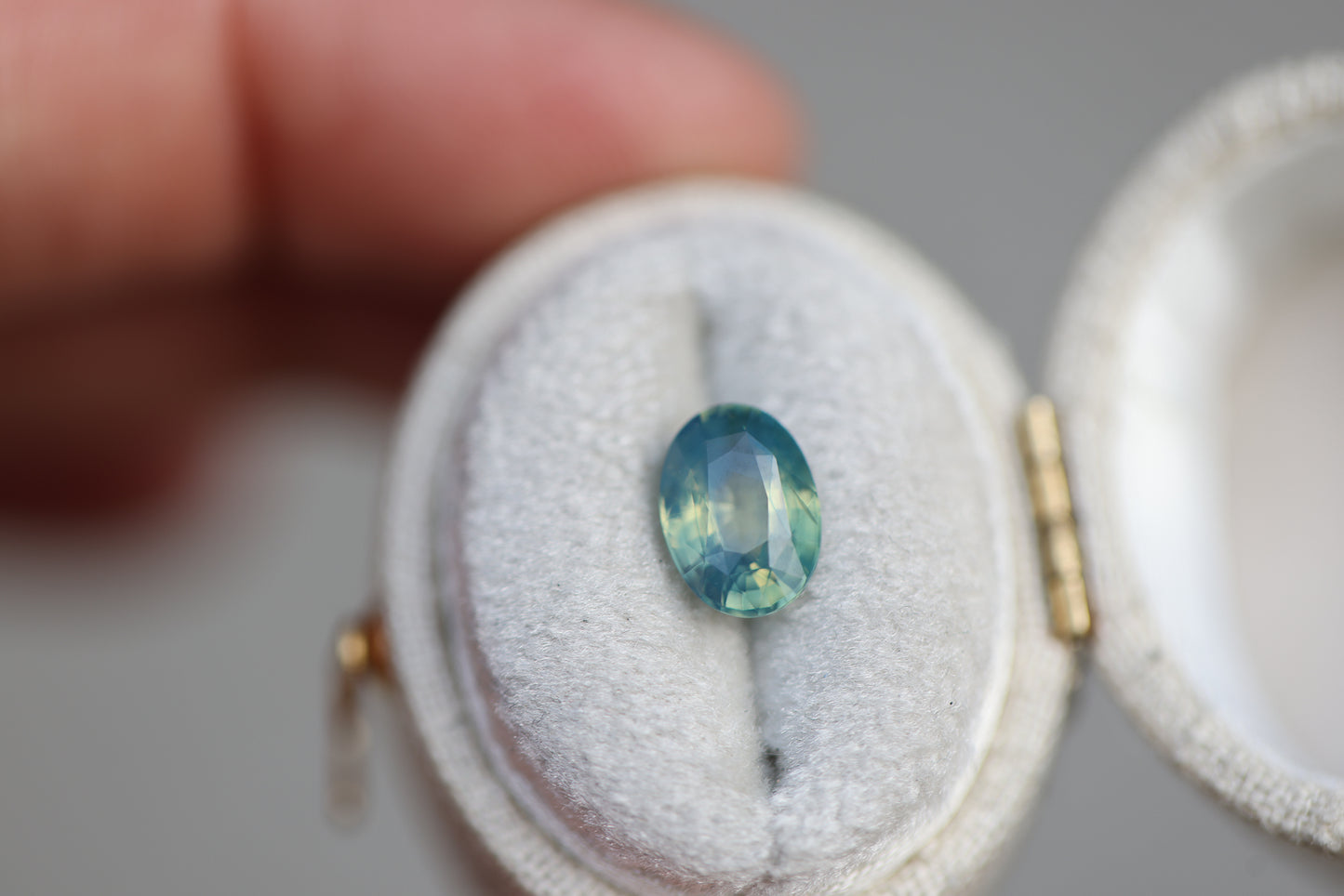 2.08ct Oval Opalescent Teal Green Sapphire