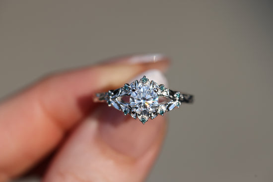 Briar Rose Solitaire with 6mm Round Moissanite and Teal Blue Diamonds