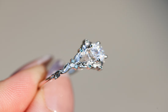 Briar Rose Solitaire with 6mm Round Moissanite and Teal Blue Diamonds