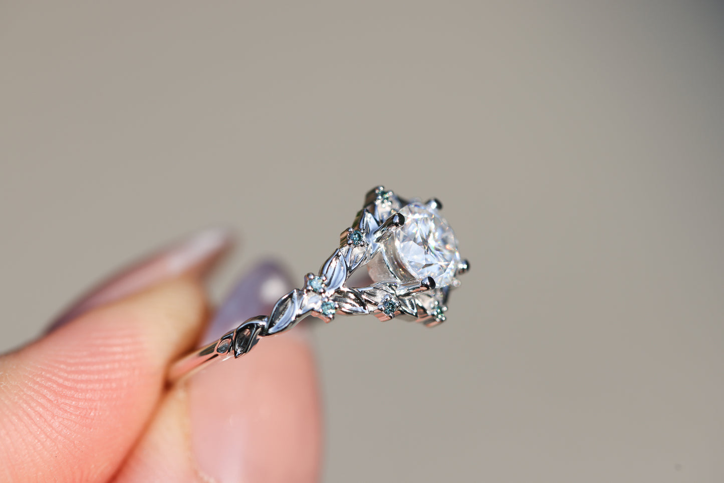 Briar Rose Solitaire with 6mm Round Moissanite and Teal Blue Diamonds