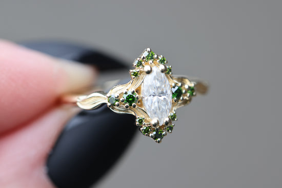 Astraea half halo with marquise moissanite and dark green irradiated diamonds