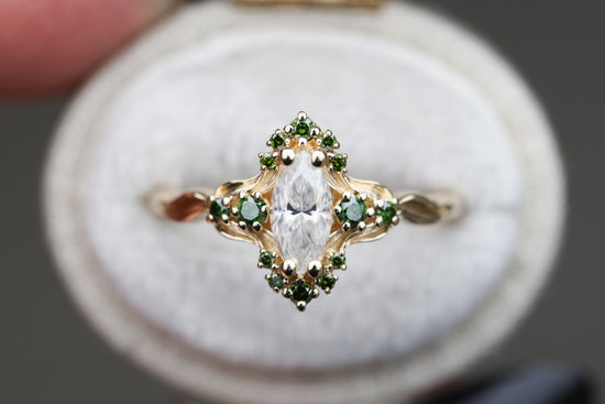 Astraea half halo with marquise moissanite and dark green irradiated diamonds