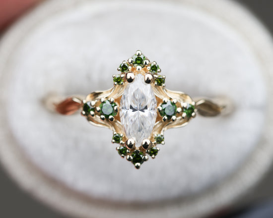 Astraea half halo with marquise moissanite and dark green irradiated diamonds