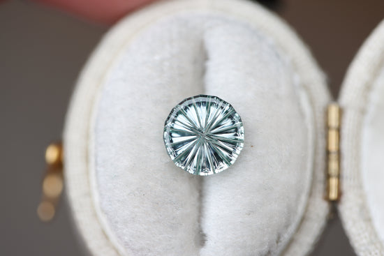 1.46ct round light blue green sapphire - Starbrite cut by John Dyer