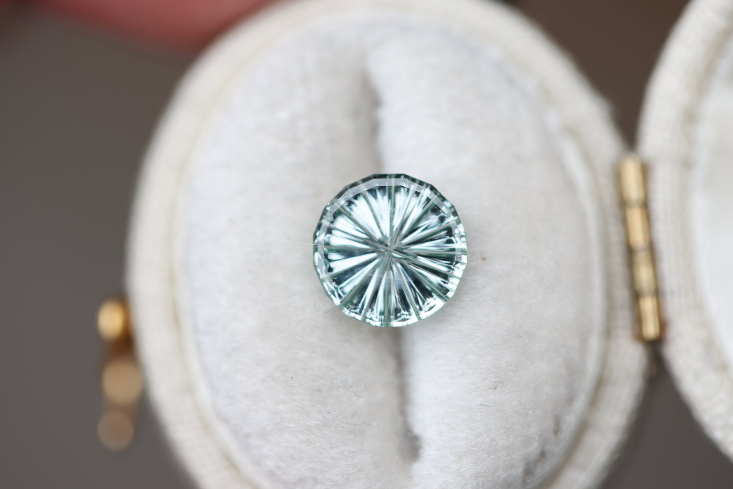 1.46ct round light blue green sapphire - Starbrite cut by John Dyer