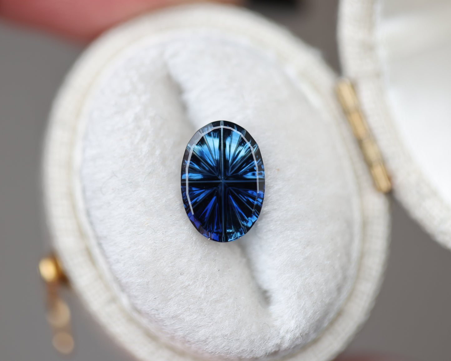 1.59ct oval light to dark blue sapphire - Starbrite cut by John Dyer