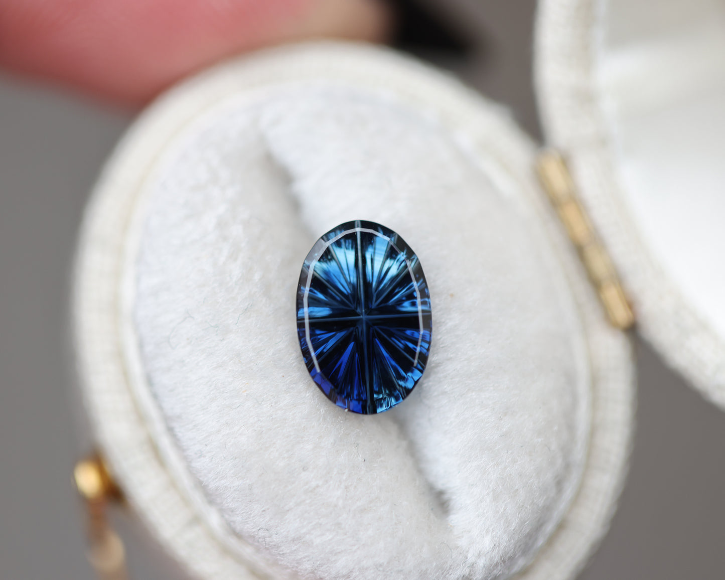 1.59ct oval light to dark blue sapphire - Starbrite cut by John Dyer