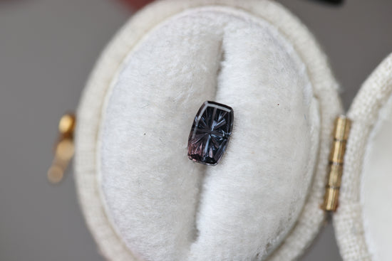 Load image into Gallery viewer, .88ct rectangle purple/blueish grey sapphire - Starbrite cut by John Dyer
