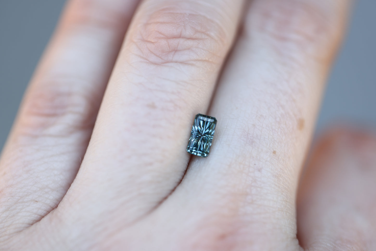 .96ct rectangle teal sapphire, Starbrite cut by John Dyer