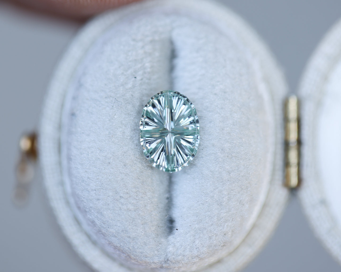 1.14ct oval light green grey sapphire, Starbrite cut by John Dyer