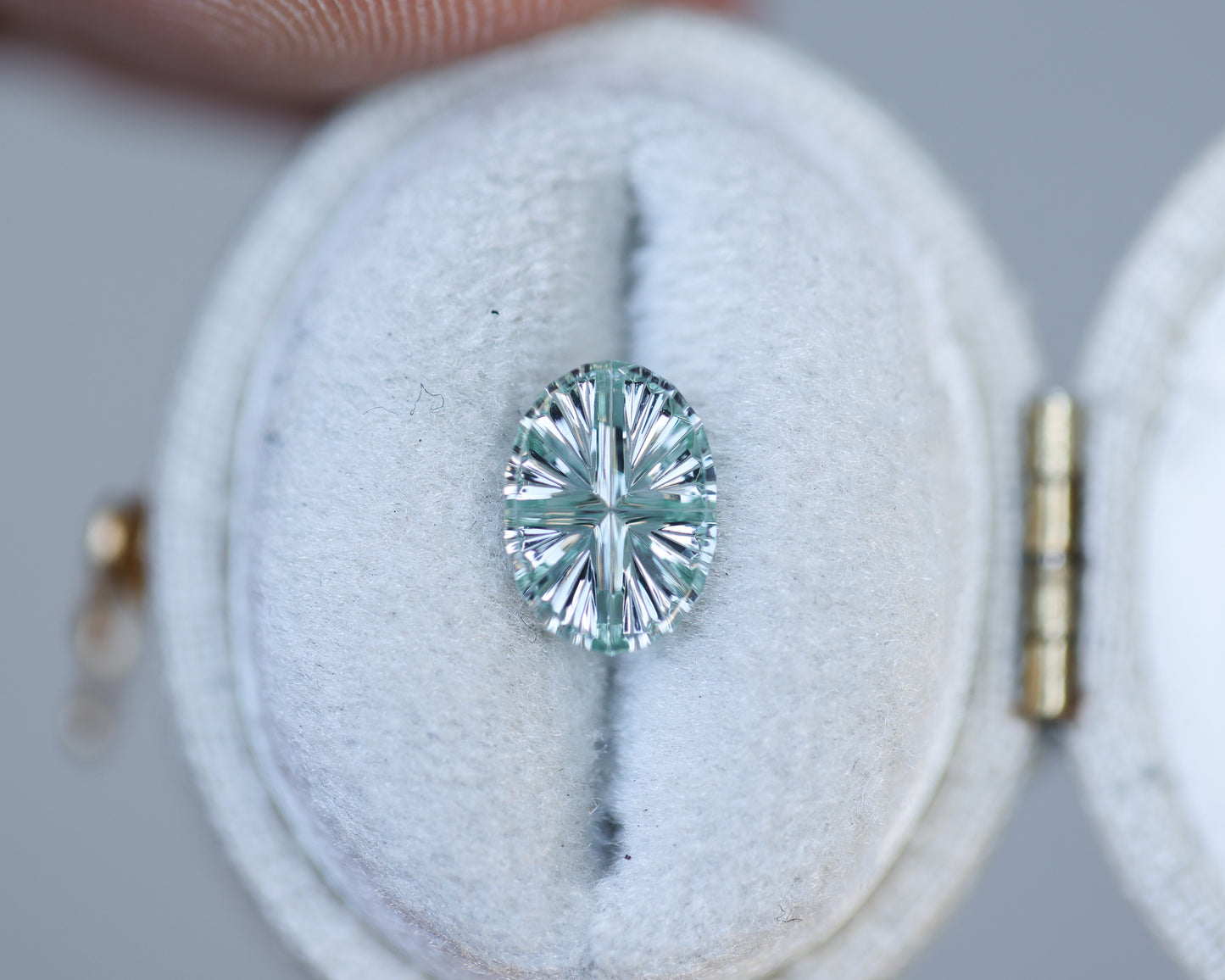 1.14ct oval light green grey sapphire, Starbrite cut by John Dyer