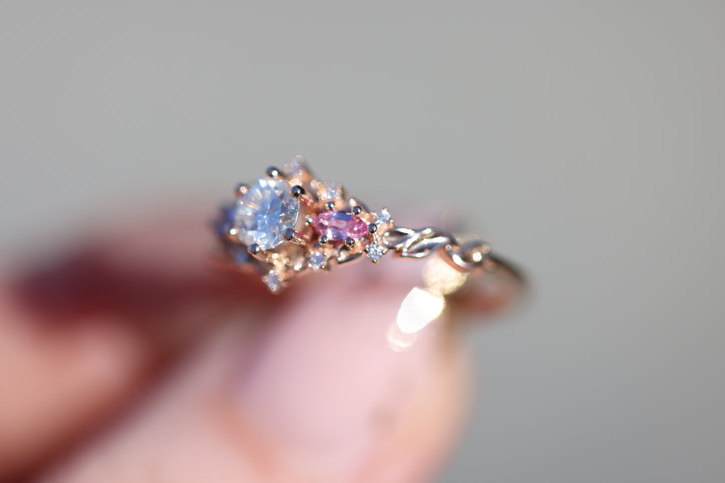 Briar rose three stone with round moissanite and natural pink sapphire