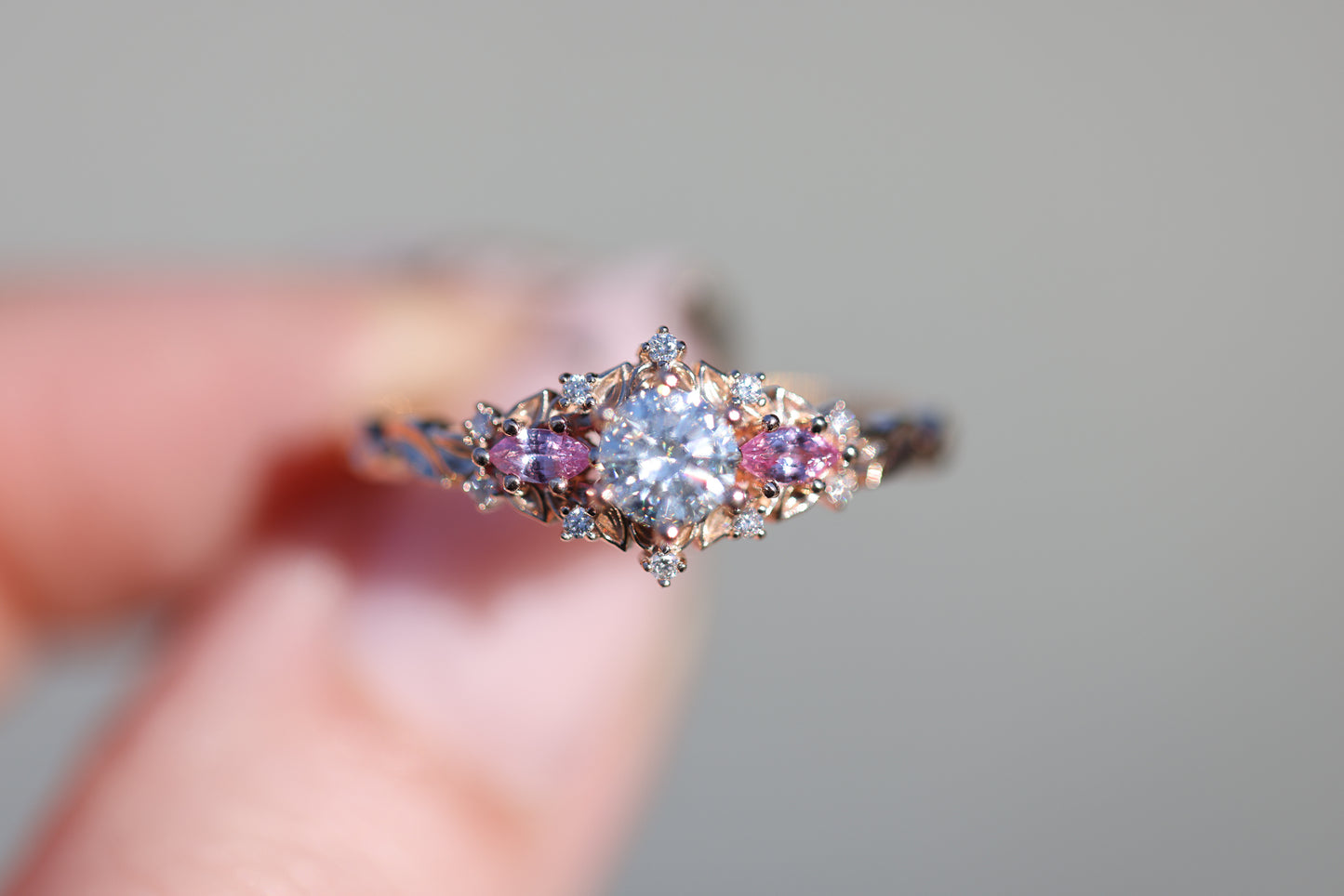 Briar rose three stone with round moissanite and natural pink sapphire