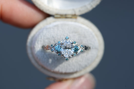 Briar Rose Three Stone with .7ct Oval Lab Diamond and Aqua Diamond