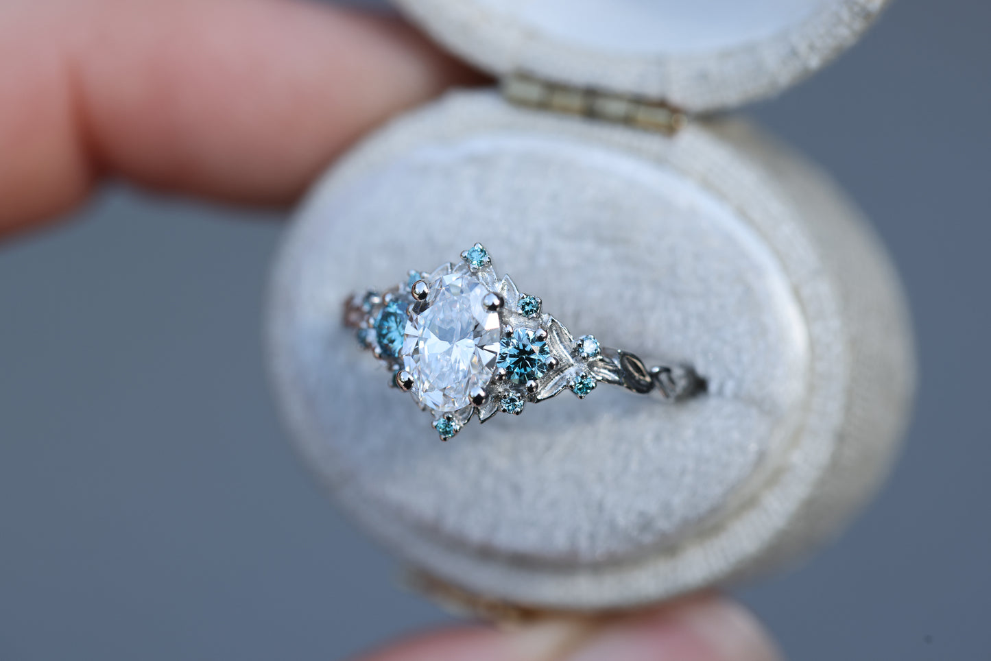 Briar Rose Three Stone with .7ct Oval Lab Diamond and Aqua Diamond