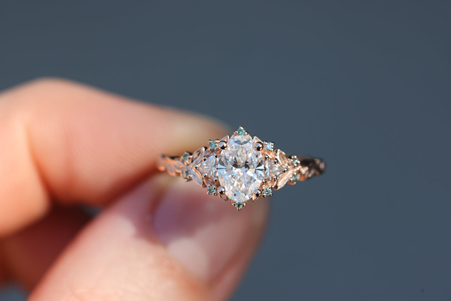 Briar Rose Three Stone with .7ct Oval Lab Diamond and Mint Diamond Accents