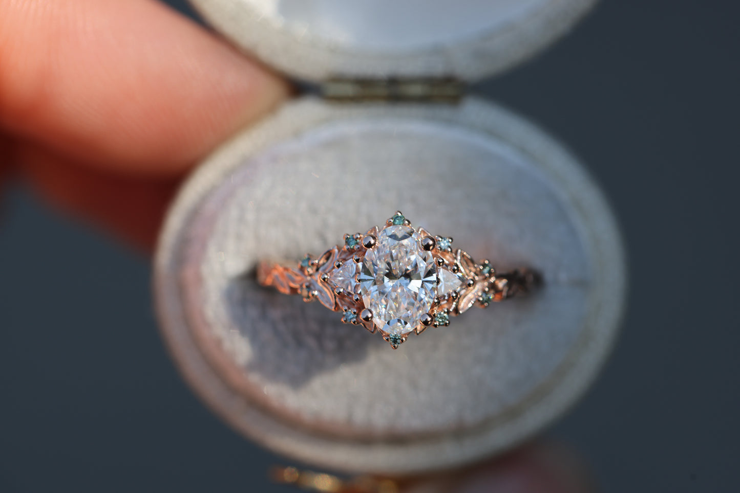 Briar Rose Three Stone with .7ct Oval Lab Diamond and Mint Diamond Accents