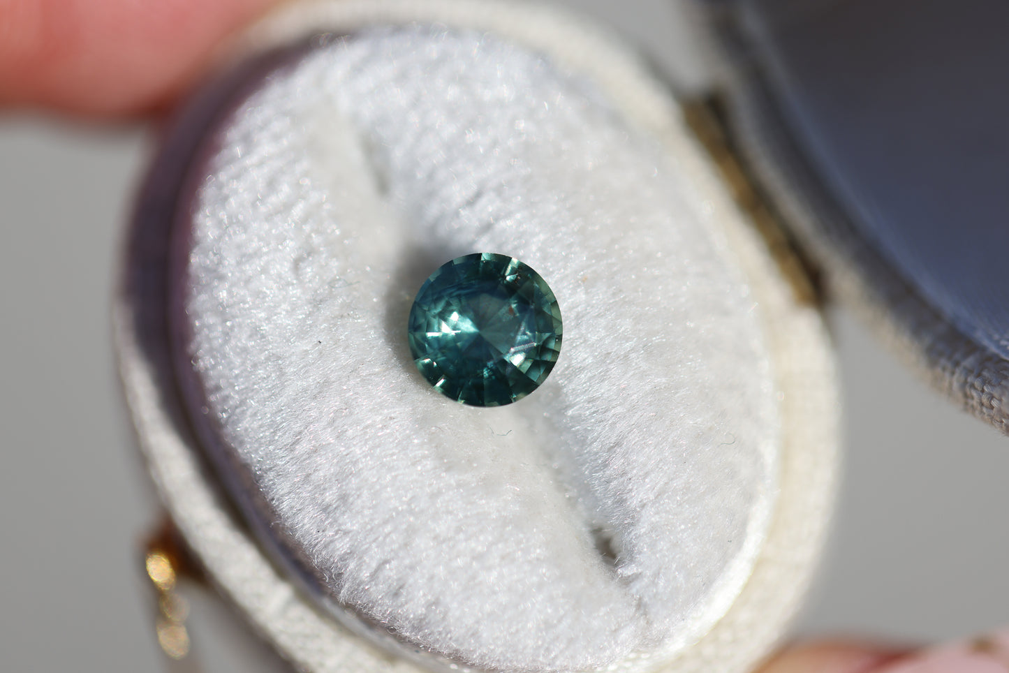 1.18ct round green teal sapphire