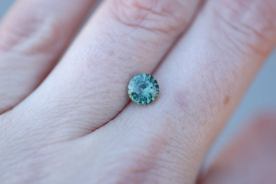 1.36ct round green teal sapphire