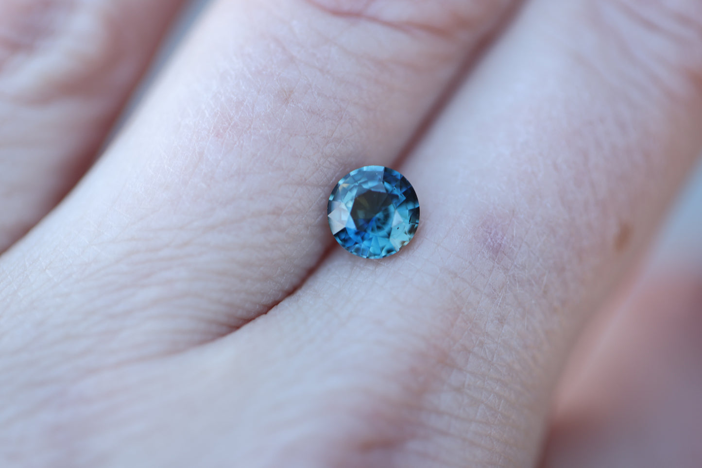 1.2ct round blue teal sapphire