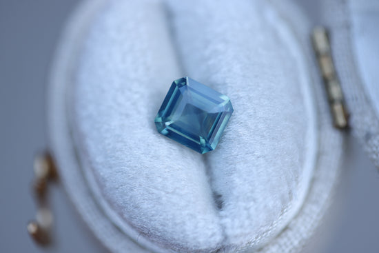 1.18ct emerald cut opalescent blue teal sapphire