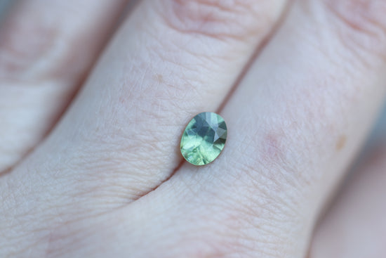 1.21ct oval opalescent green teal sapphire