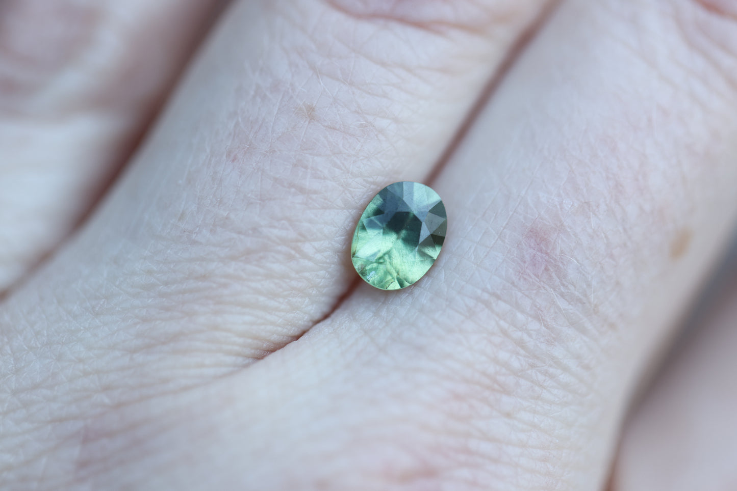 1.21ct oval opalescent green teal sapphire