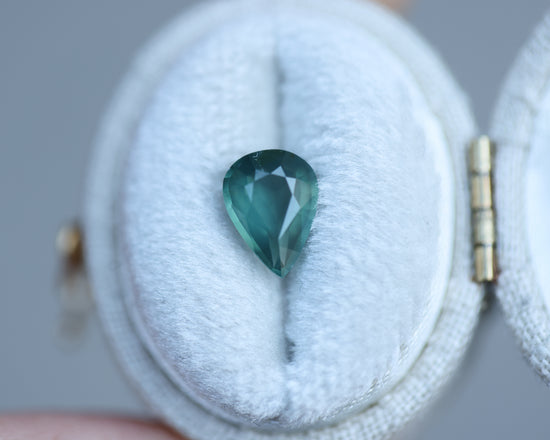 1.63ct pear opalescent teal sapphire