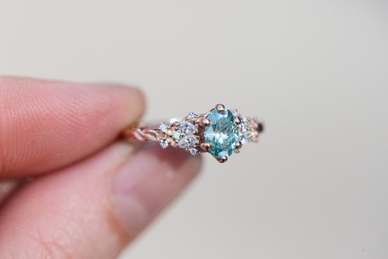 Enchanted garden 7x5mm teal moissanite