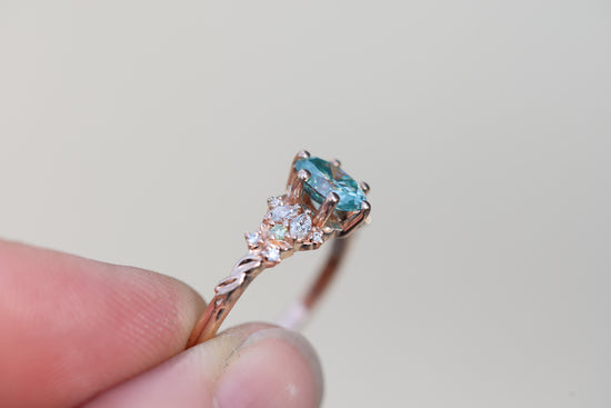 Enchanted garden 7x5mm teal moissanite