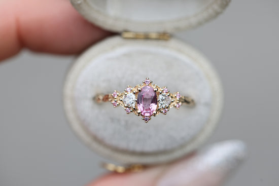 Briar Rose Three Stone with Oval Pink Sapphire Center and Accents