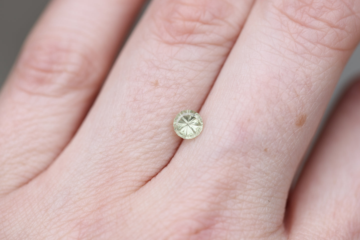 .65ct round light green yellow slightly opaque sapphire - Starbrite cut by John Dyer