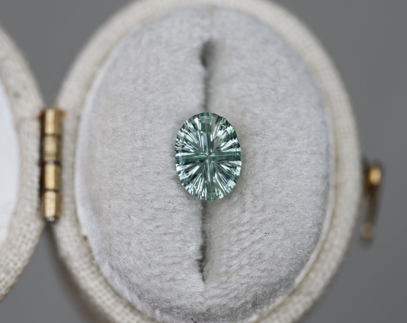 1.01ct oval light mint green sapphire - Starbrite cut by John Dyer