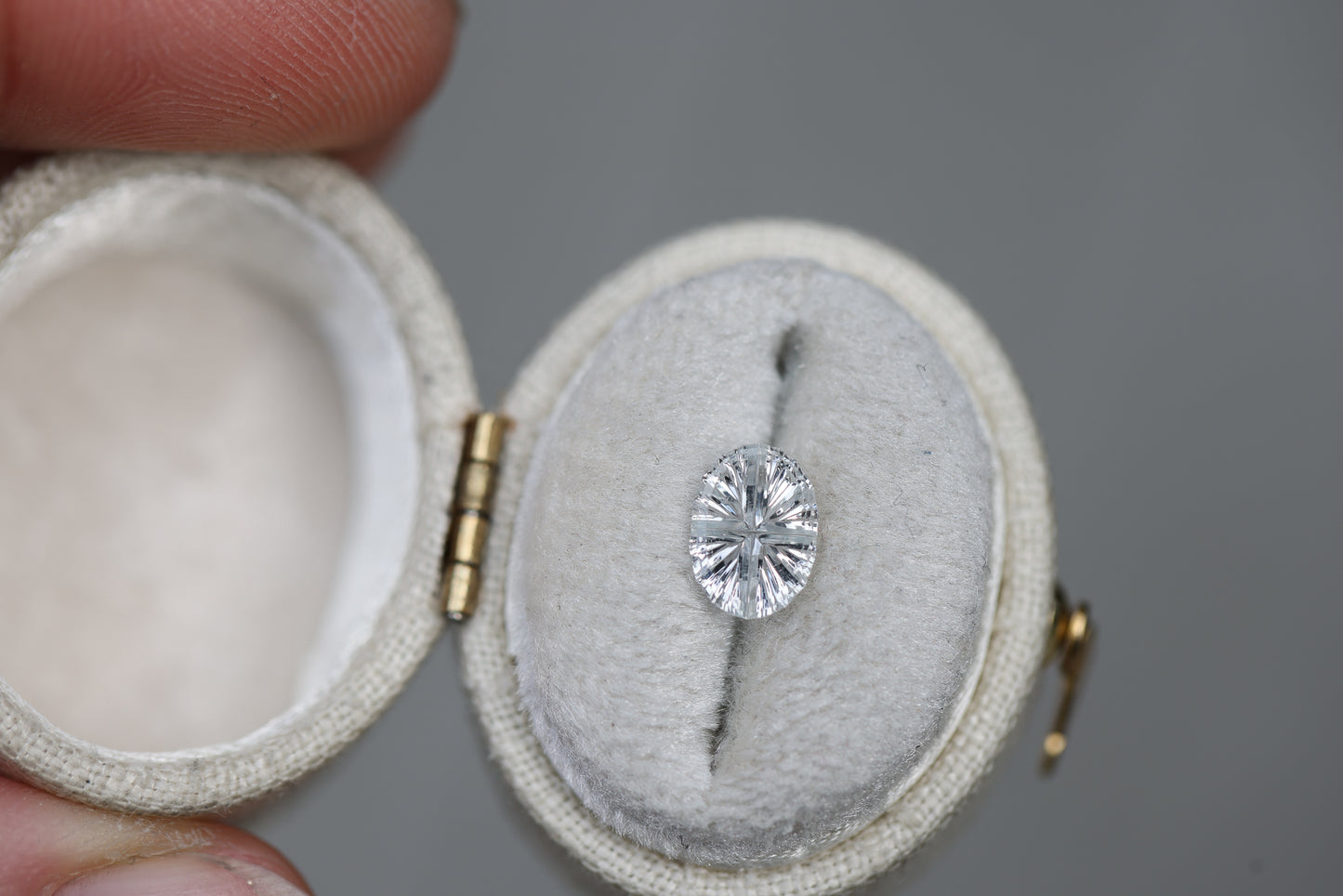 1.08ct oval white sapphire - Starbrite cut by John Dyer